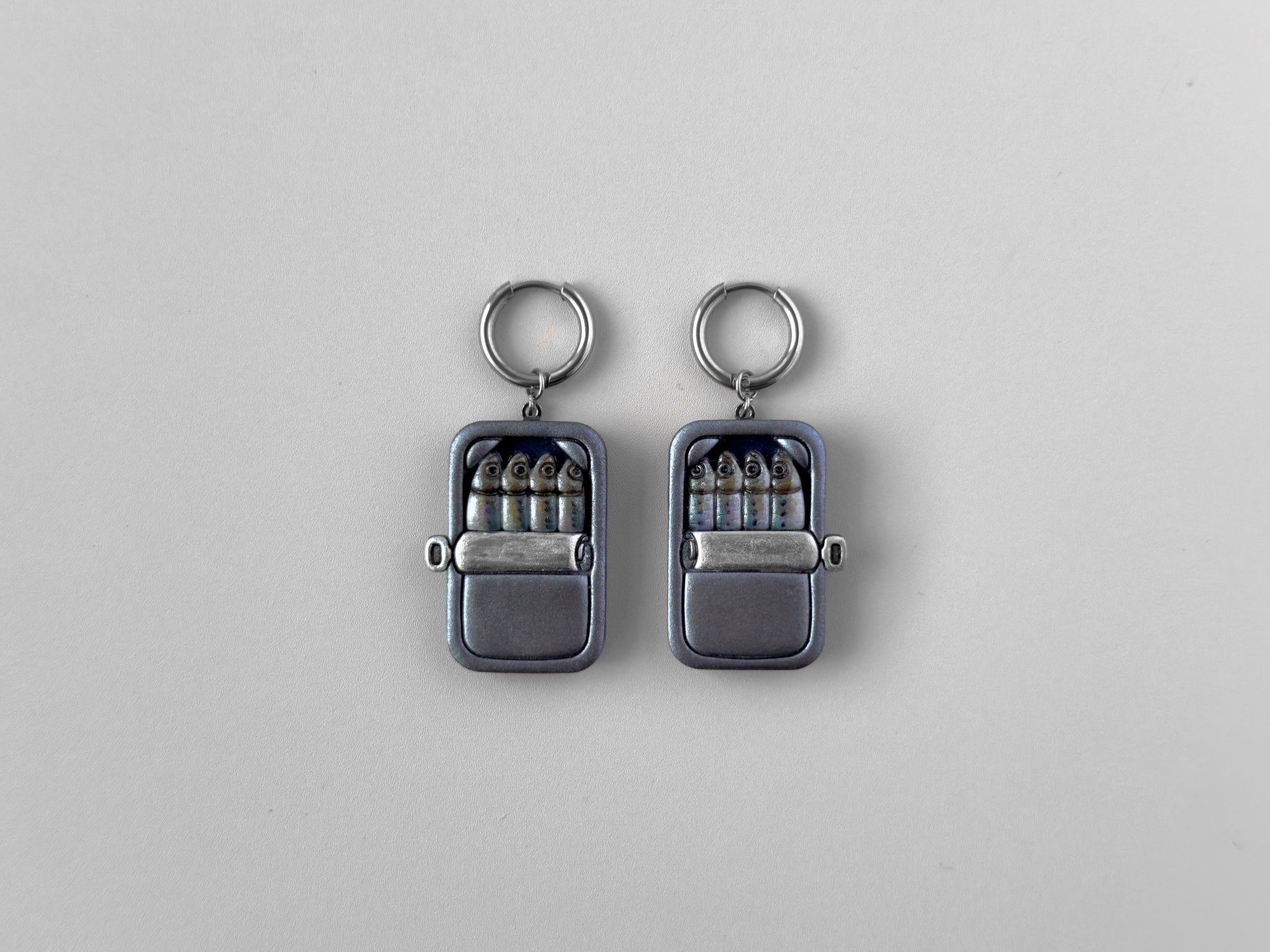 Tinned Sardine Earrings: Gunmetal & Dark Teal (Silver Chrome)
